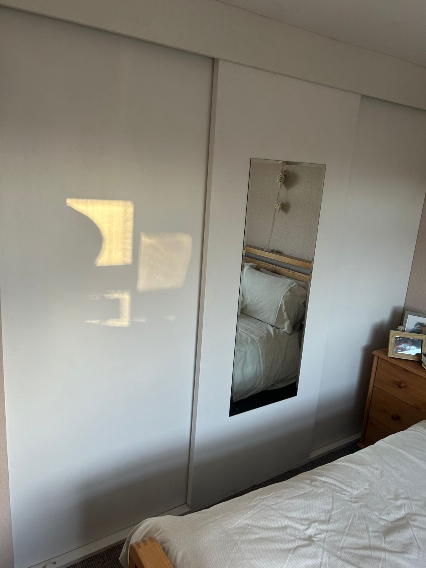 Fitted sliding wardrobe installation by AJW Carpentry in Sidmouth